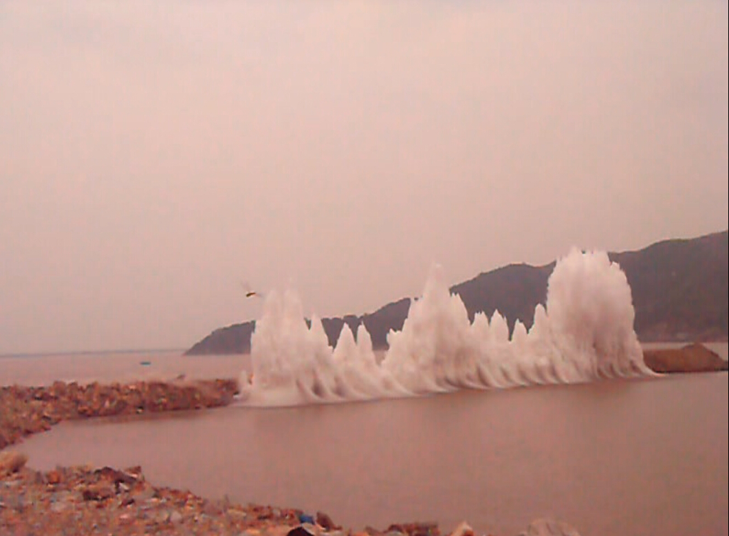 Mud‑squeezing blasting for the breakwater at Wenling Central Fishing Port